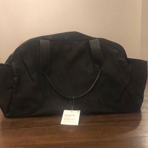 Brand new Lululemon “out of range duffel”